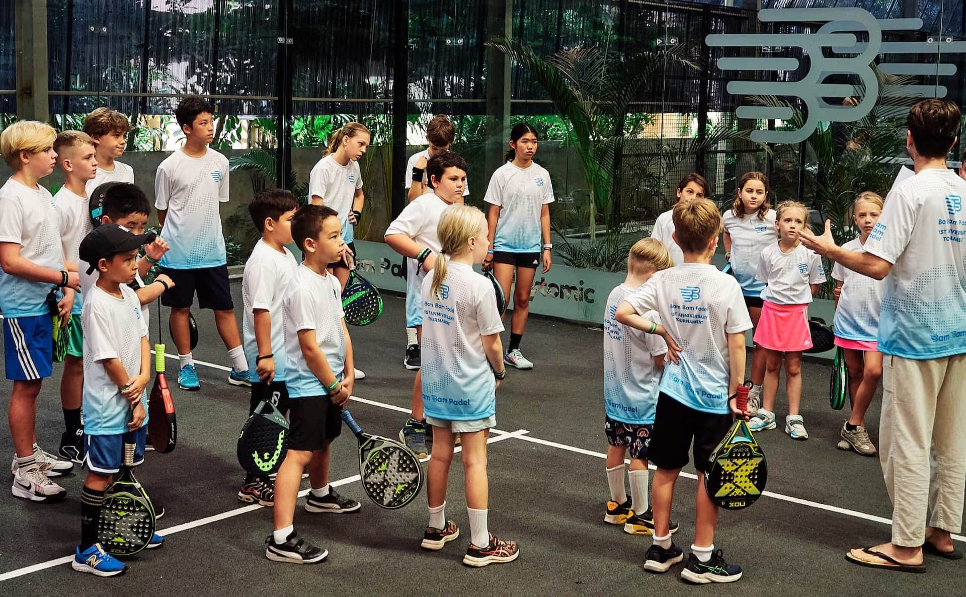 Players and coaches at Bam Bam Padel