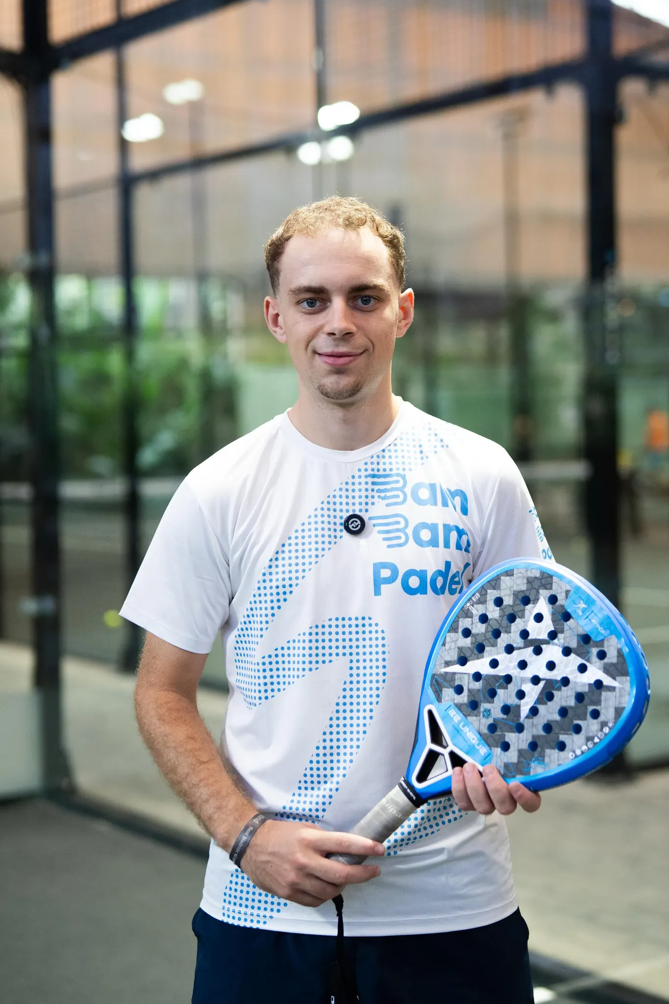 Daniel, coach at Bam Bam Padel, on court in Ubud