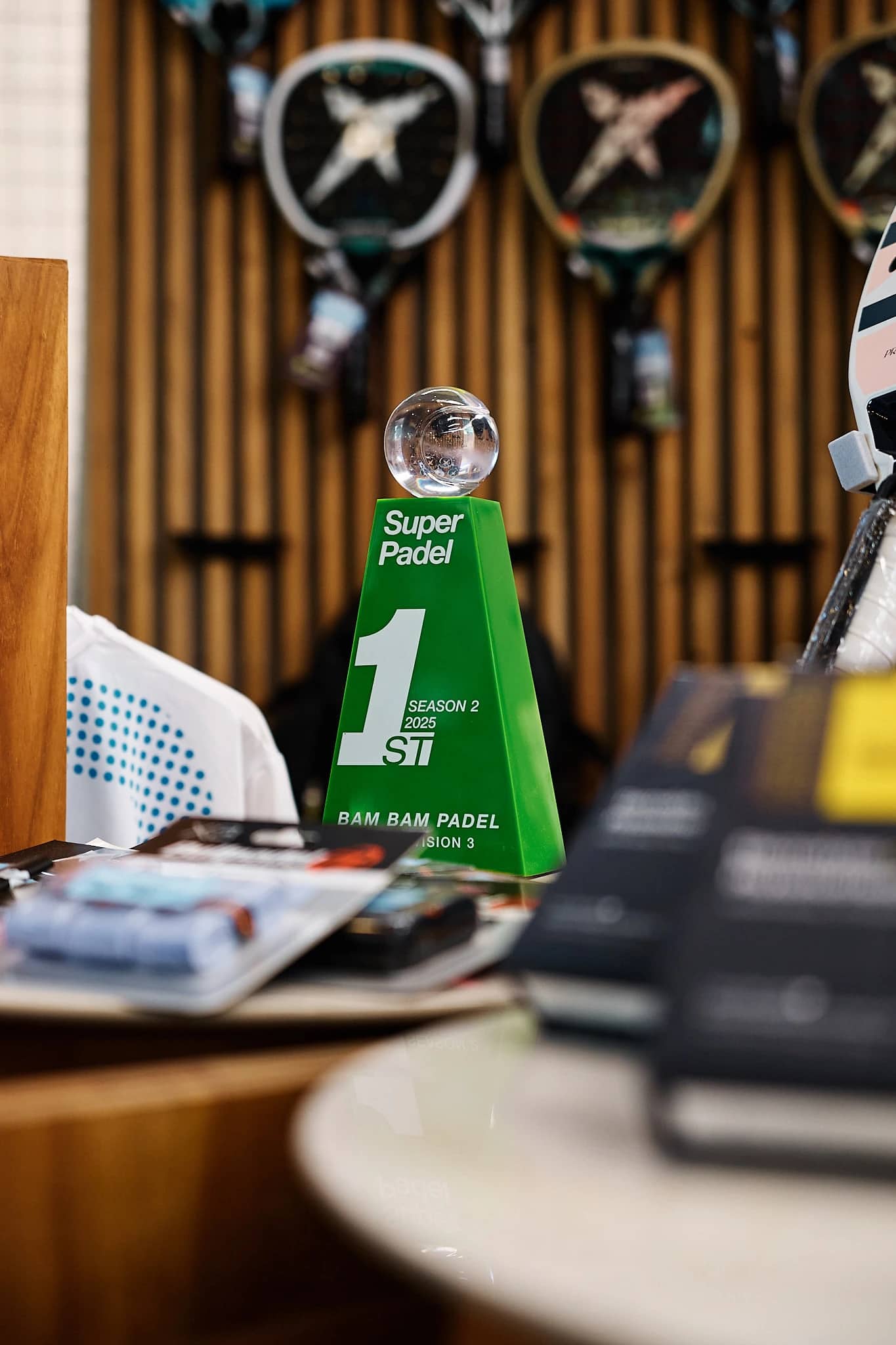 The racket display wall in the pro-shop