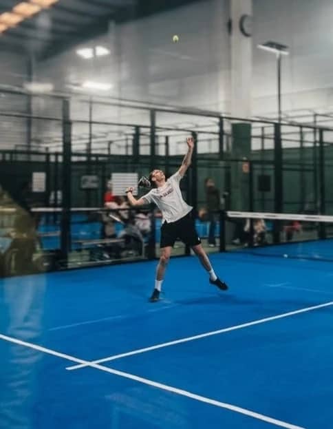 Daniel, coach at Bam Bam Padel, on court in Ubud