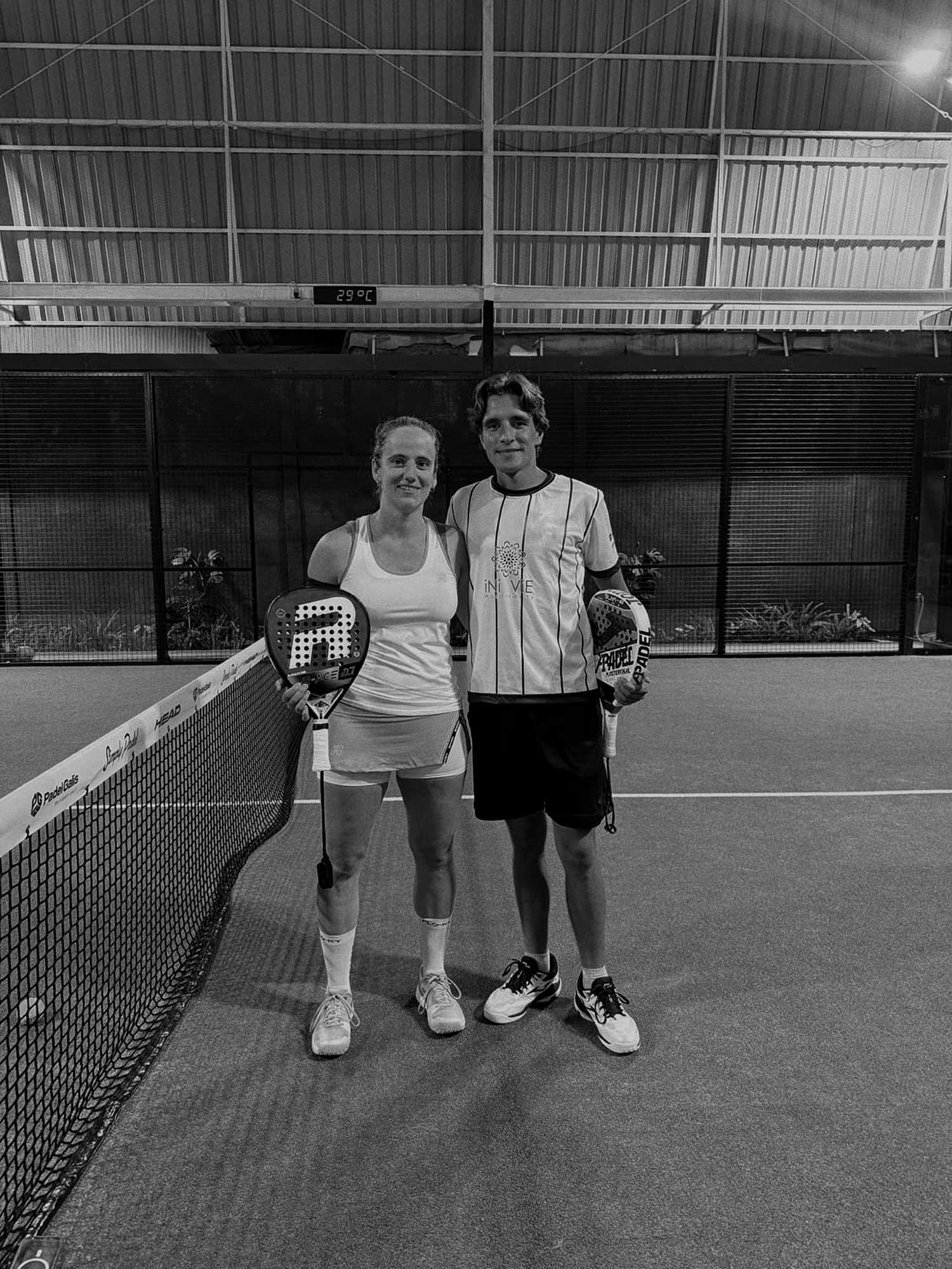 Coaches Ceres and Guillermo together at the net
