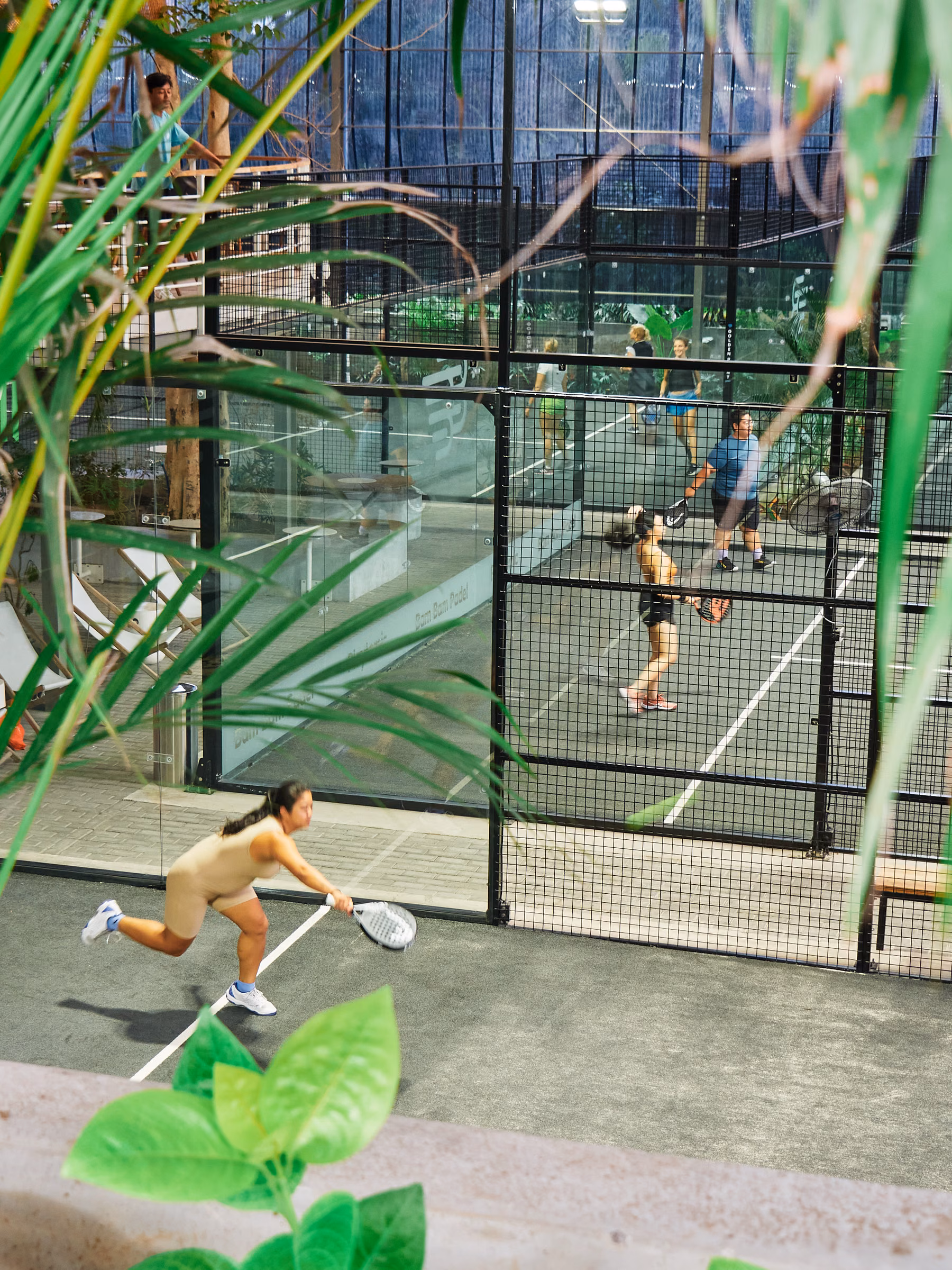 Players mid-rally at Bam Bam Padel